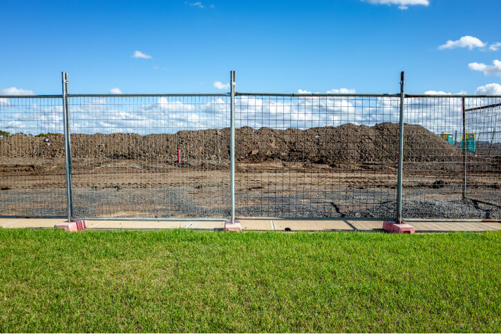 A photo of a chain link fence protecting a construction site